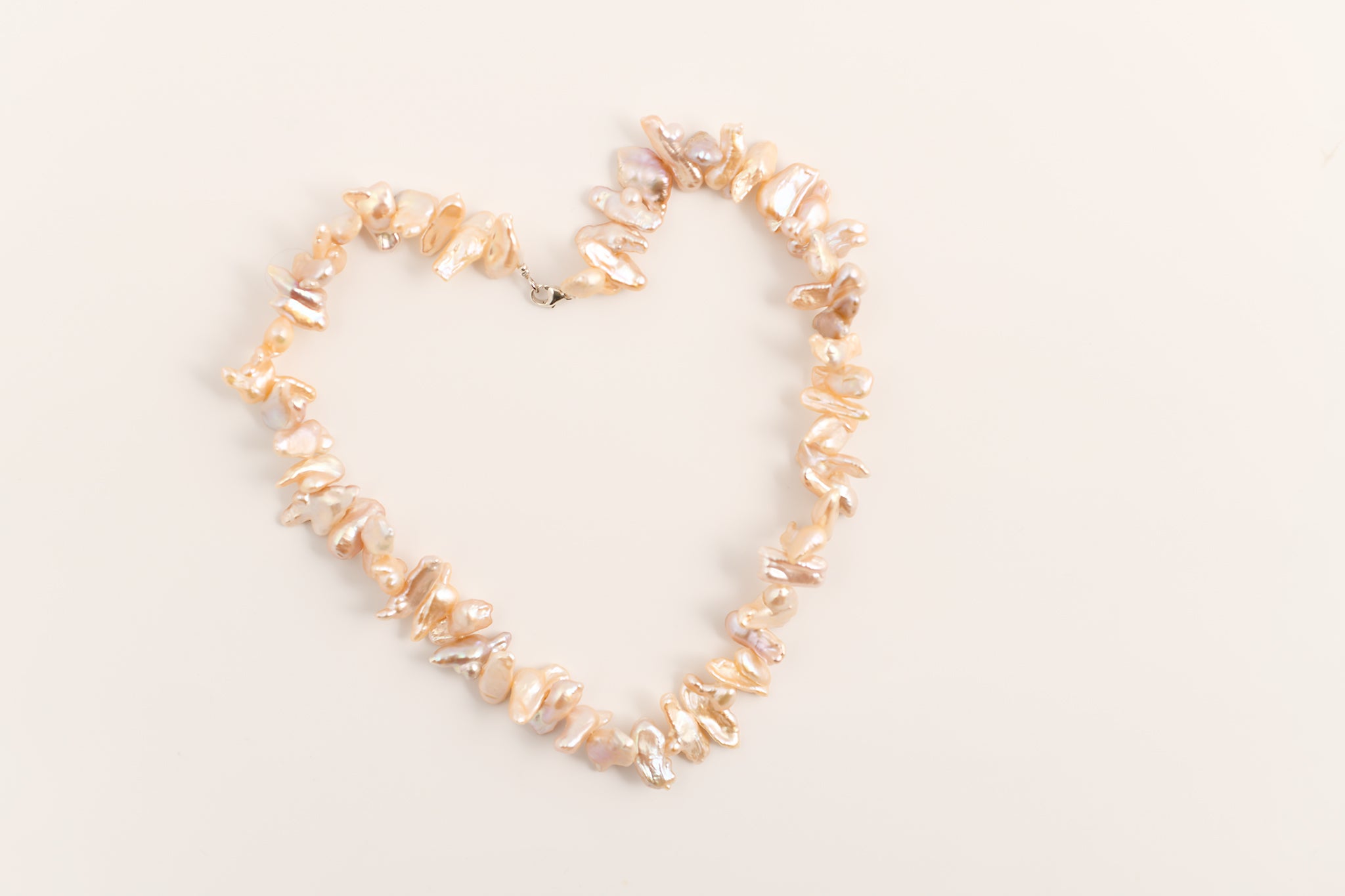 Collier de perles d'eau douce rose saumon