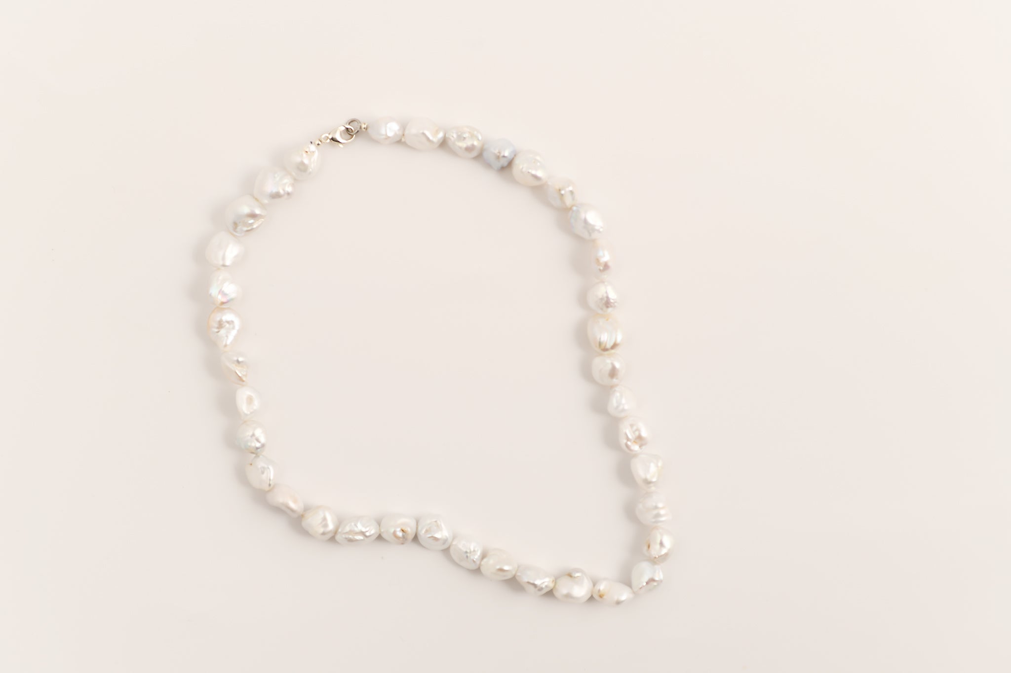 Perle d'acqua dolce Keshi bianche